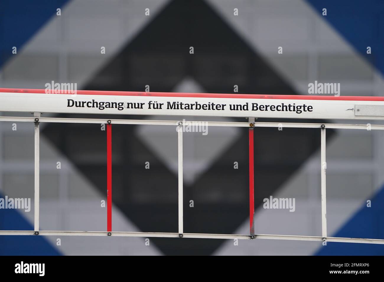 Hamburg, Germany. 03rd May, 2021. Soccer, 2. Bundesliga, training Hamburger SV, training ground Volksparkstadion: 'Passage only for employees and authorized persons' is written on a barrier at the Volksparkstadion. Credit: Marcus Brandt/dpa - IMPORTANT NOTE: In accordance with the regulations of the DFL Deutsche Fußball Liga and/or the DFB Deutscher Fußball-Bund, it is prohibited to use or have used photographs taken in the stadium and/or of the match in the form of sequence pictures and/or video-like photo series./dpa/Alamy Live News Stock Photo