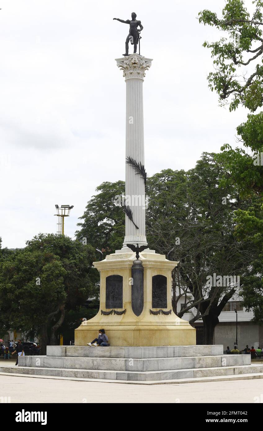 Valencia, Carabobo, Venezuela. 11th May, 2021. May 11, 2021. A young woman waits seated in the Bolivar square in the city of Valencia, Carabobo state. Photo: Juan Carlos Hernandez Credit: Juan Carlos Hernandez/ZUMA Wire/Alamy Live News Stock Photo