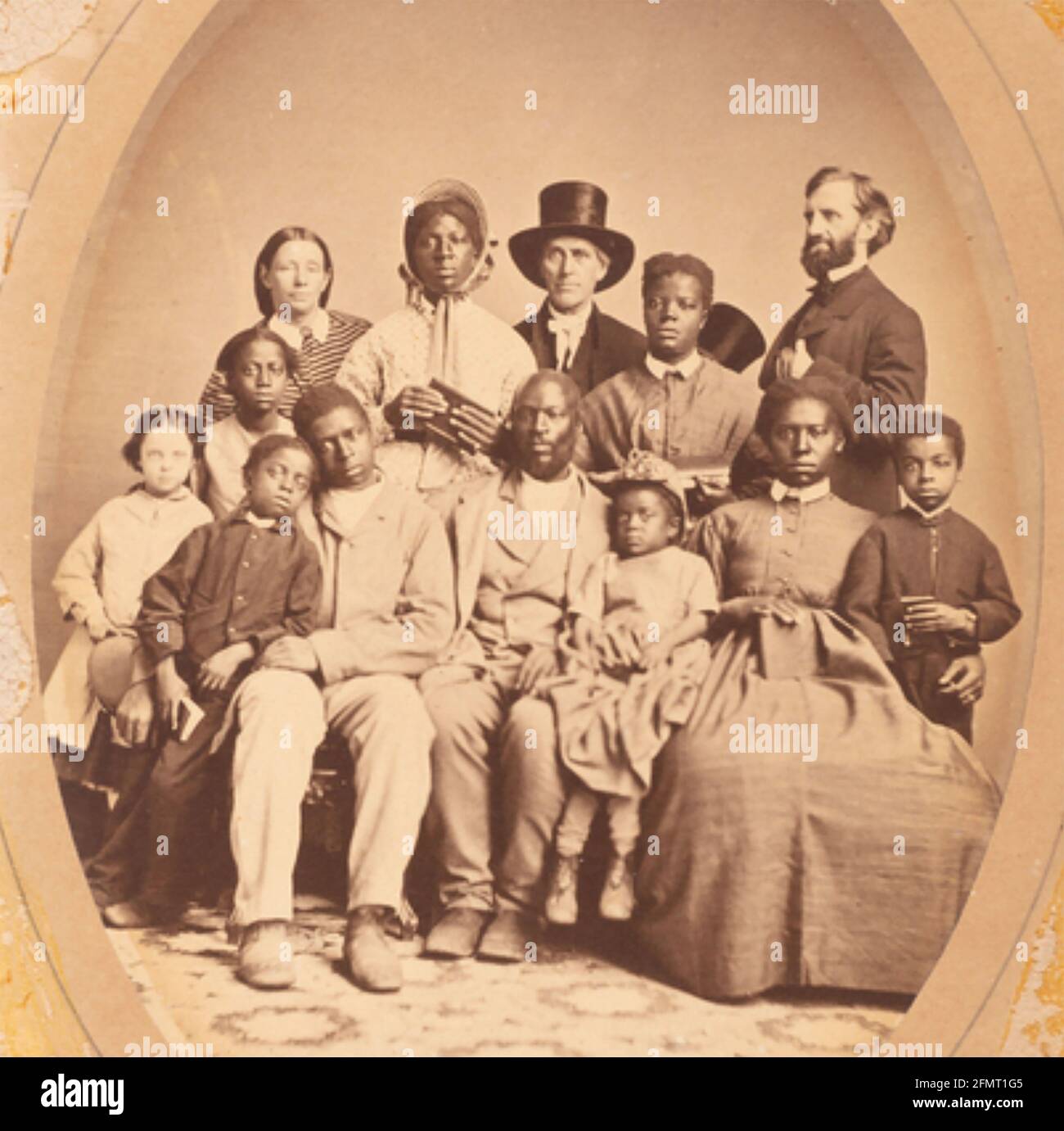 LEVI COFFIN (1798-1877) American Quaker and abolitionist (centre with hat) with his friend Jonathan  Rummel far rights and group of former slaves they rescued. Stock Photo