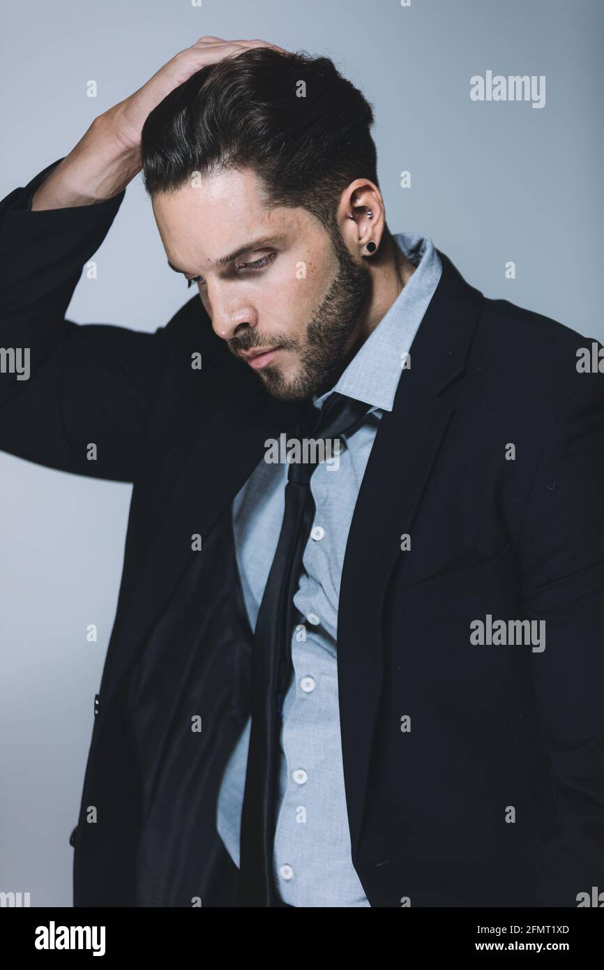 Handsome man posing in a studio Stock Photo
