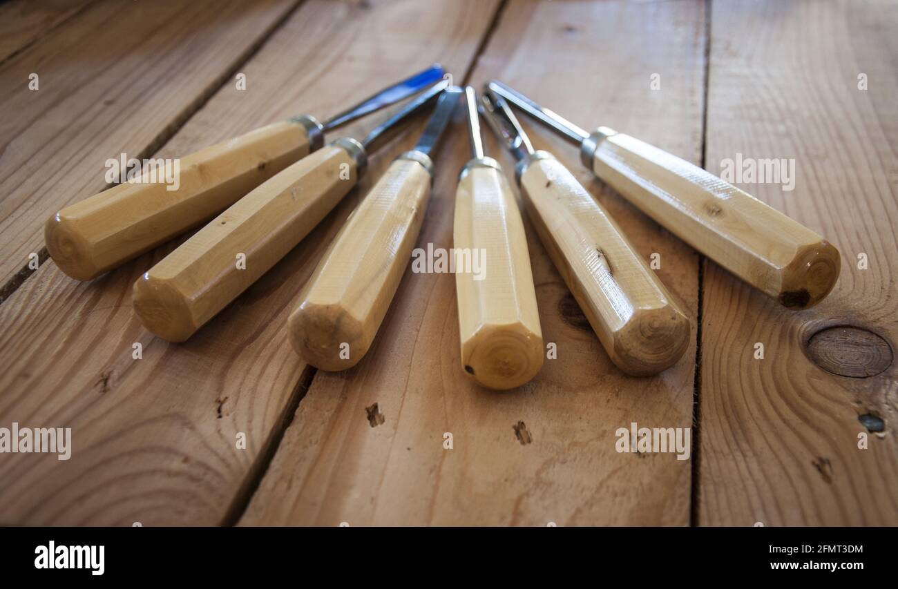 Selective focus shot of wooden handles of gouges Stock Photo - Alamy