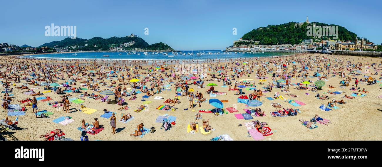 San Sebastian, Spain - August 22, 2016: Watches on the beach promenade of La Concha in San Sebastian in a sunny day on August Stock Photo