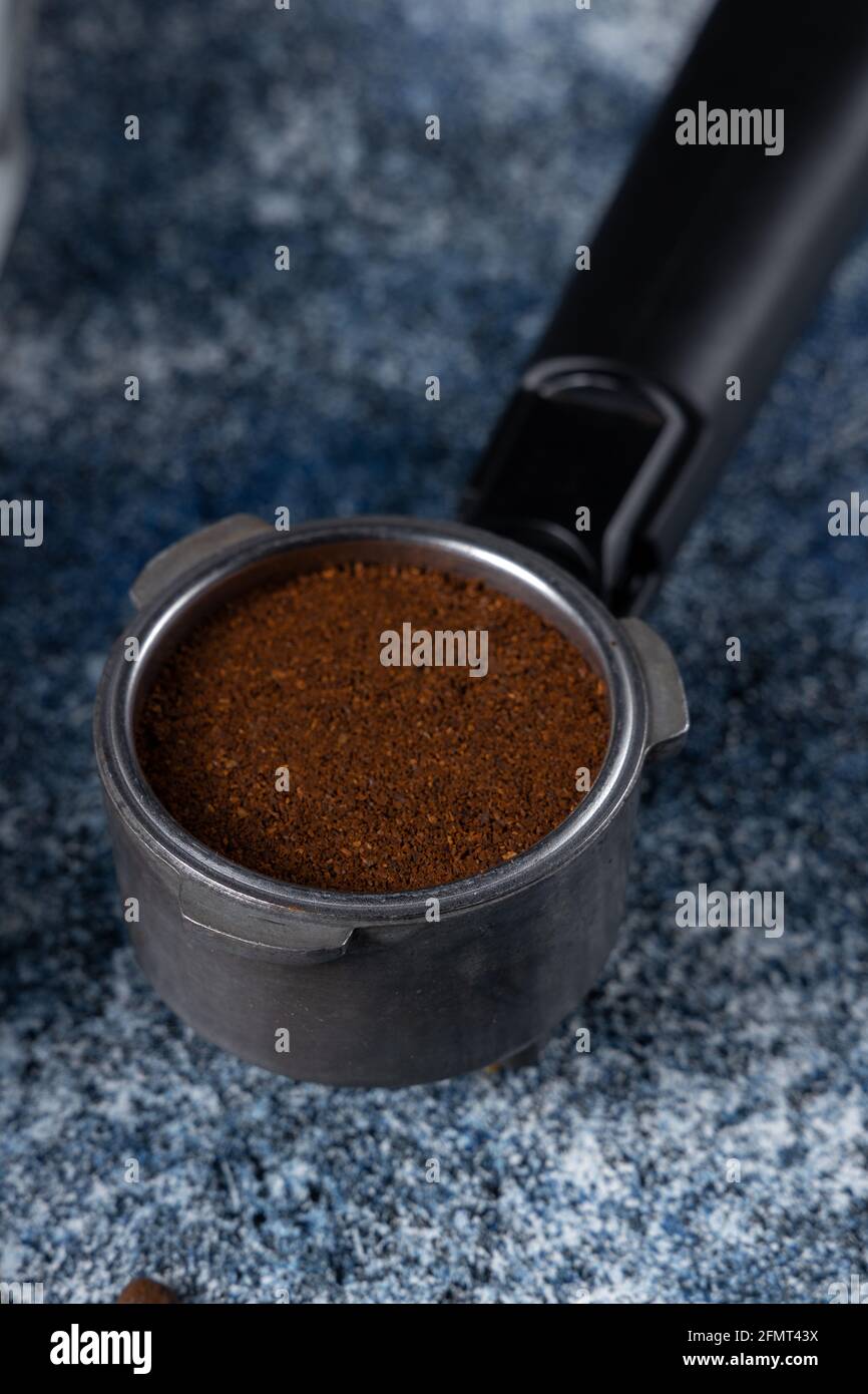 Vertical shot of a container of the ground coffee for Stock Photo - Alamy