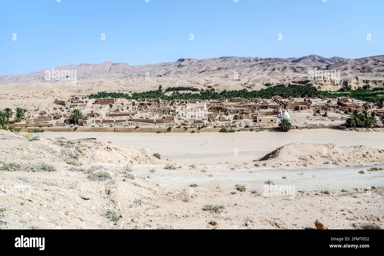 Old Berber Village, Tamerza Mides Ruins of ancient village in mountain oasis Chebika. Tunise Stock Photo