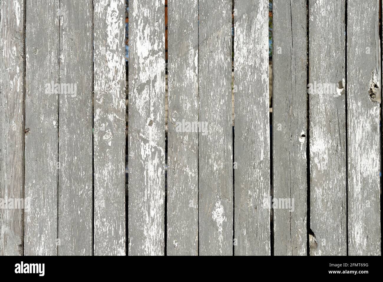 Wood texture creating a nice abstract surface with old white scratched paint. Stock Photo