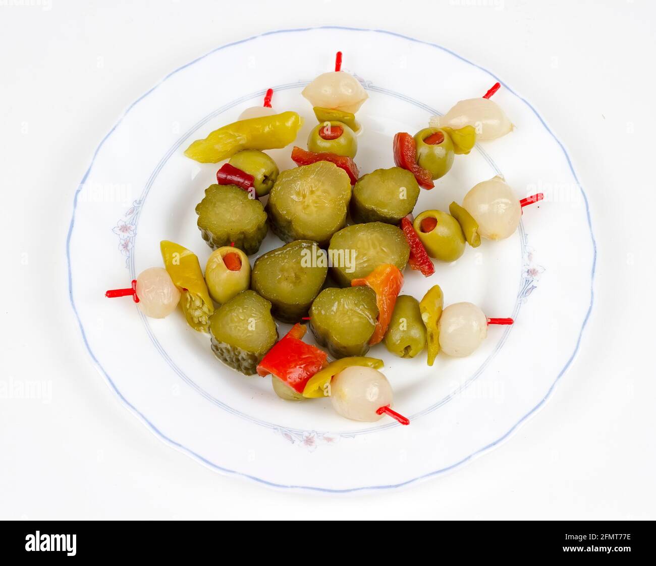 spanish banderillas, skewers with pickling olives, garlic, pickles
