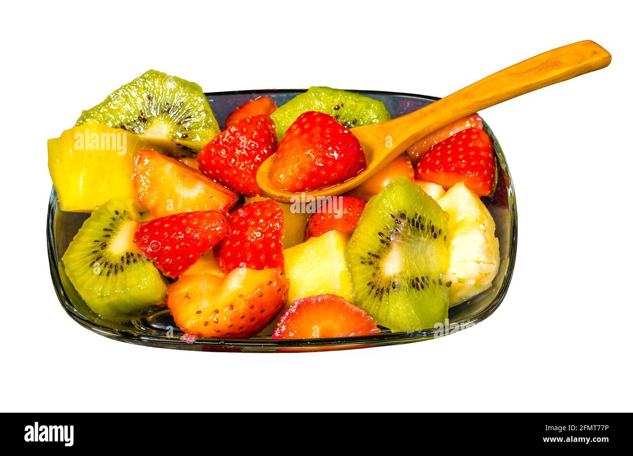 fresh fruit macedonia cut into cubes,Isolated blank background with spoon Stock Photo
