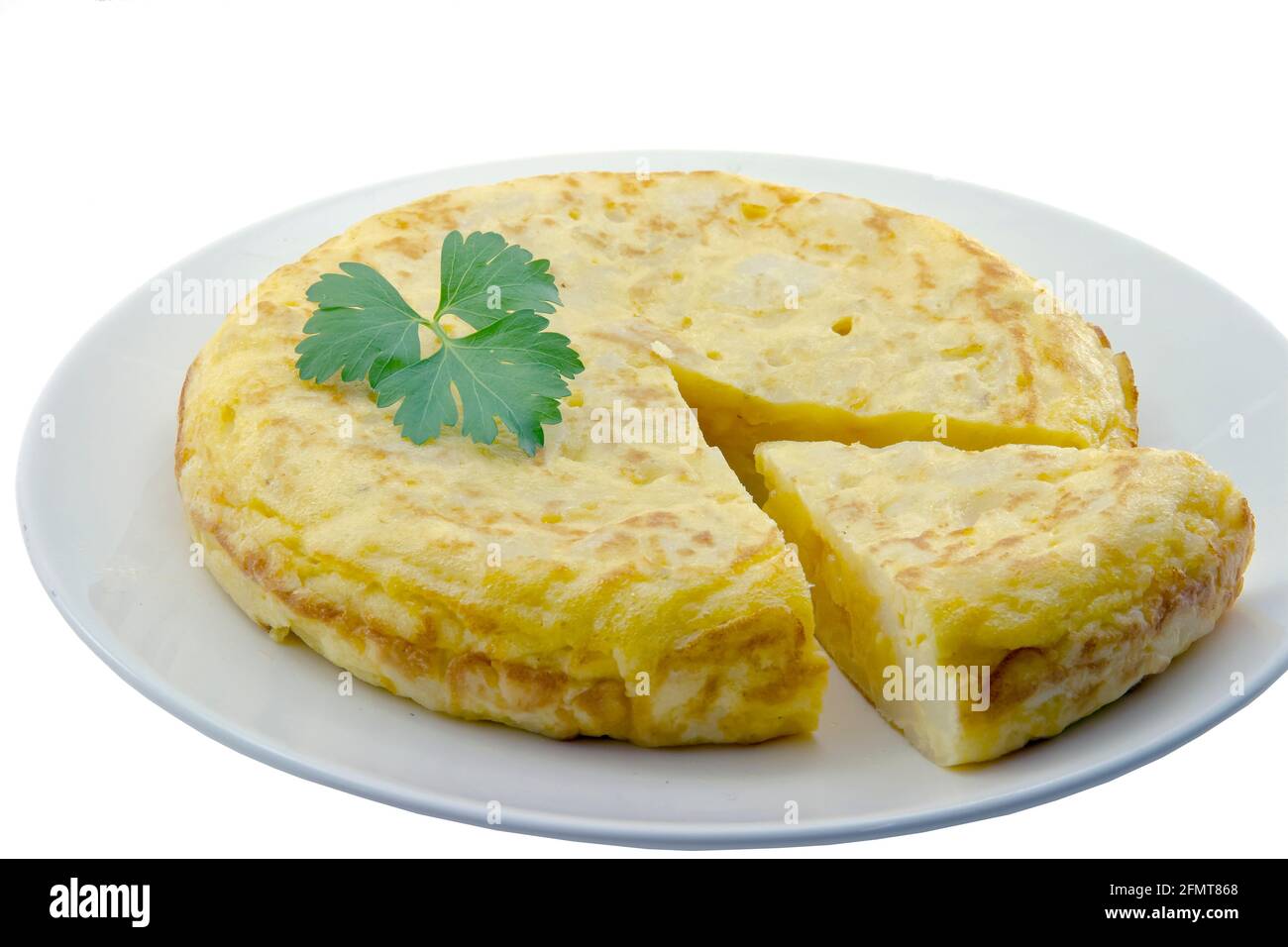 Spanish omelette with potatoes, parsley leaf gift auction, white background Stock Photo