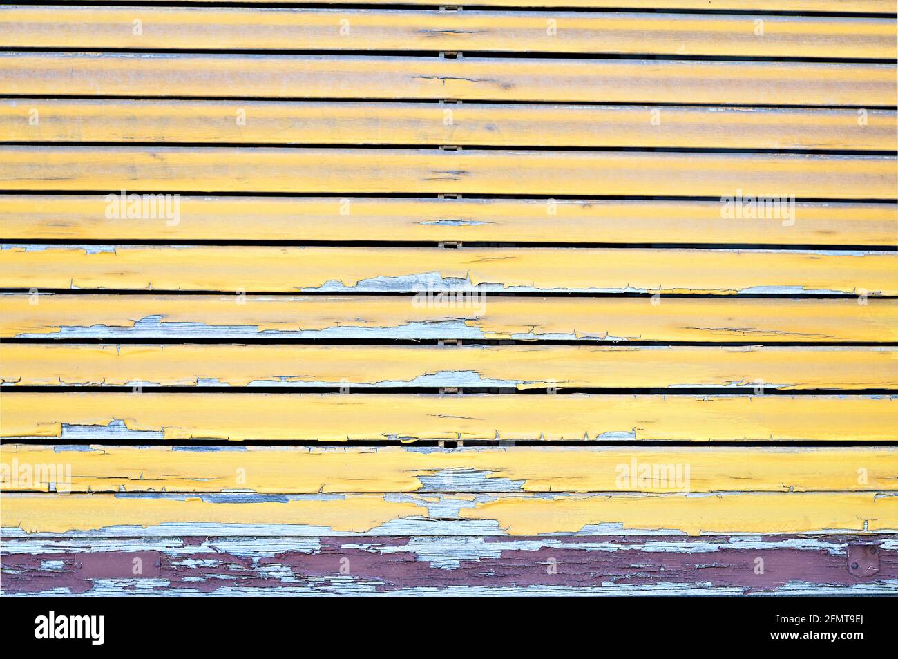 roller shutter ruined and stripped from the weather Stock Photo