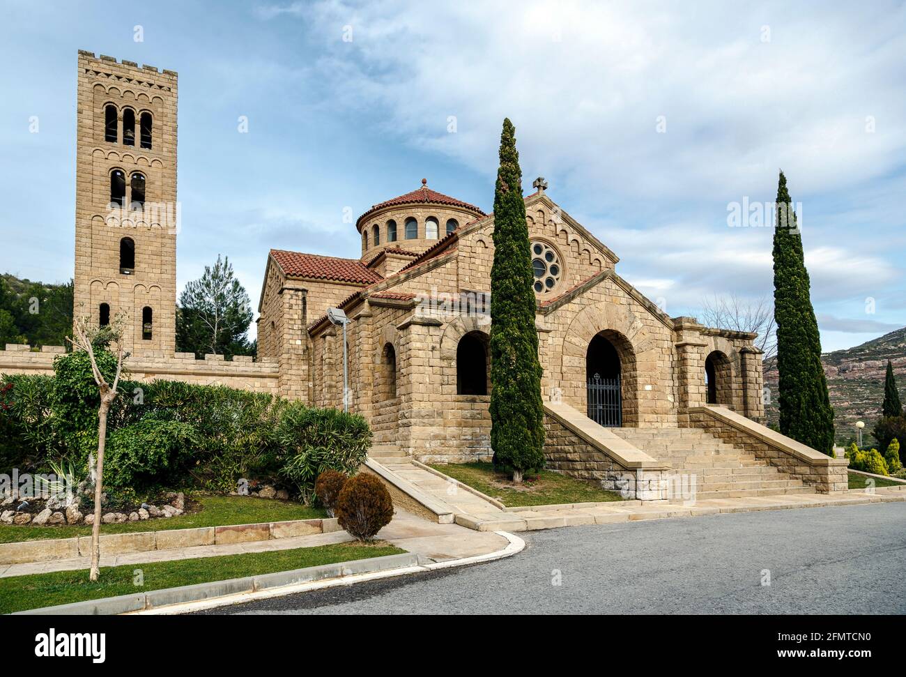 Church of the Mare de Deu del Roser, Our Lady of rosary, Neo-Romanesque cultural heritage and place of worship. Monistrol de Montserrat, Province of B Stock Photo