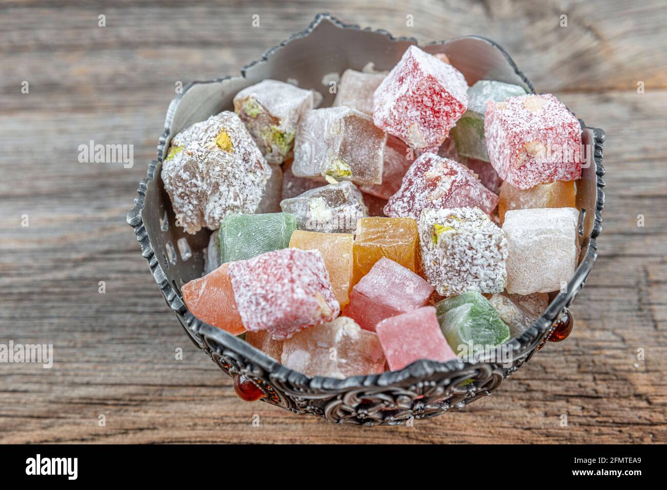 Turkish delight colorful jelly cubes called lokum. Variety of Turkish Delight Lokum Sweet Turkish delight lokum Traditional dessert. Stock Photo