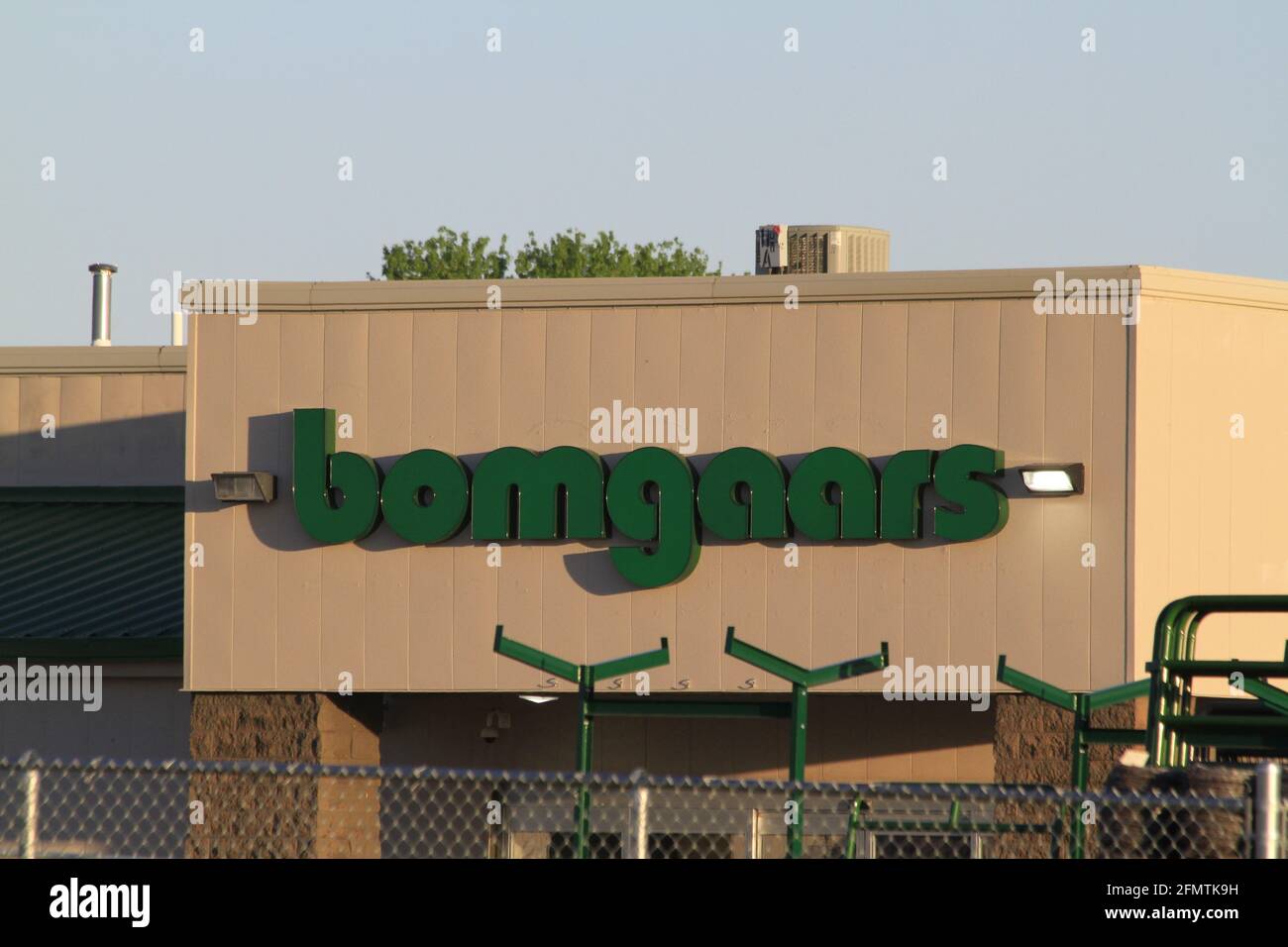 bomgaars advertisement signs shot closeup with blue sky that's on a