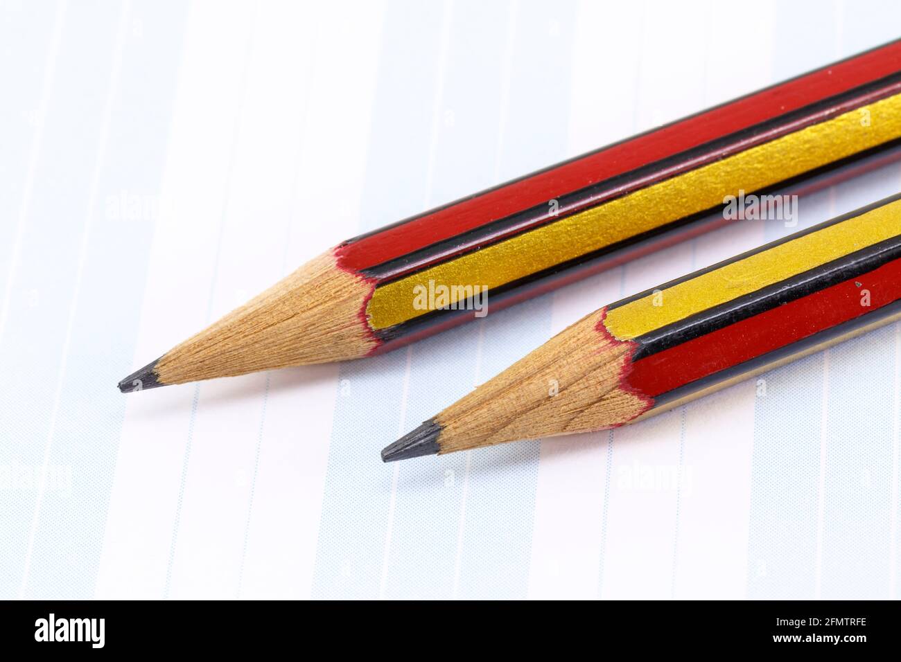 charcoal pencils continuous computer paper white and blue Stock Photo ...