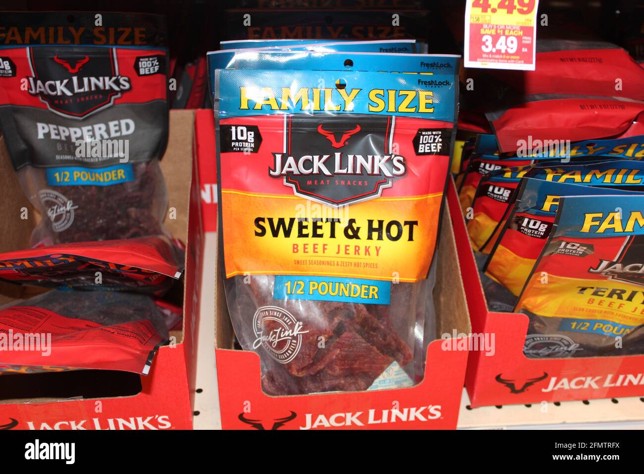 Jack Links Sweet and Hot Beef Jerky on a metal shelf shot closeup in a grocery store in Kansas. Stock Photo