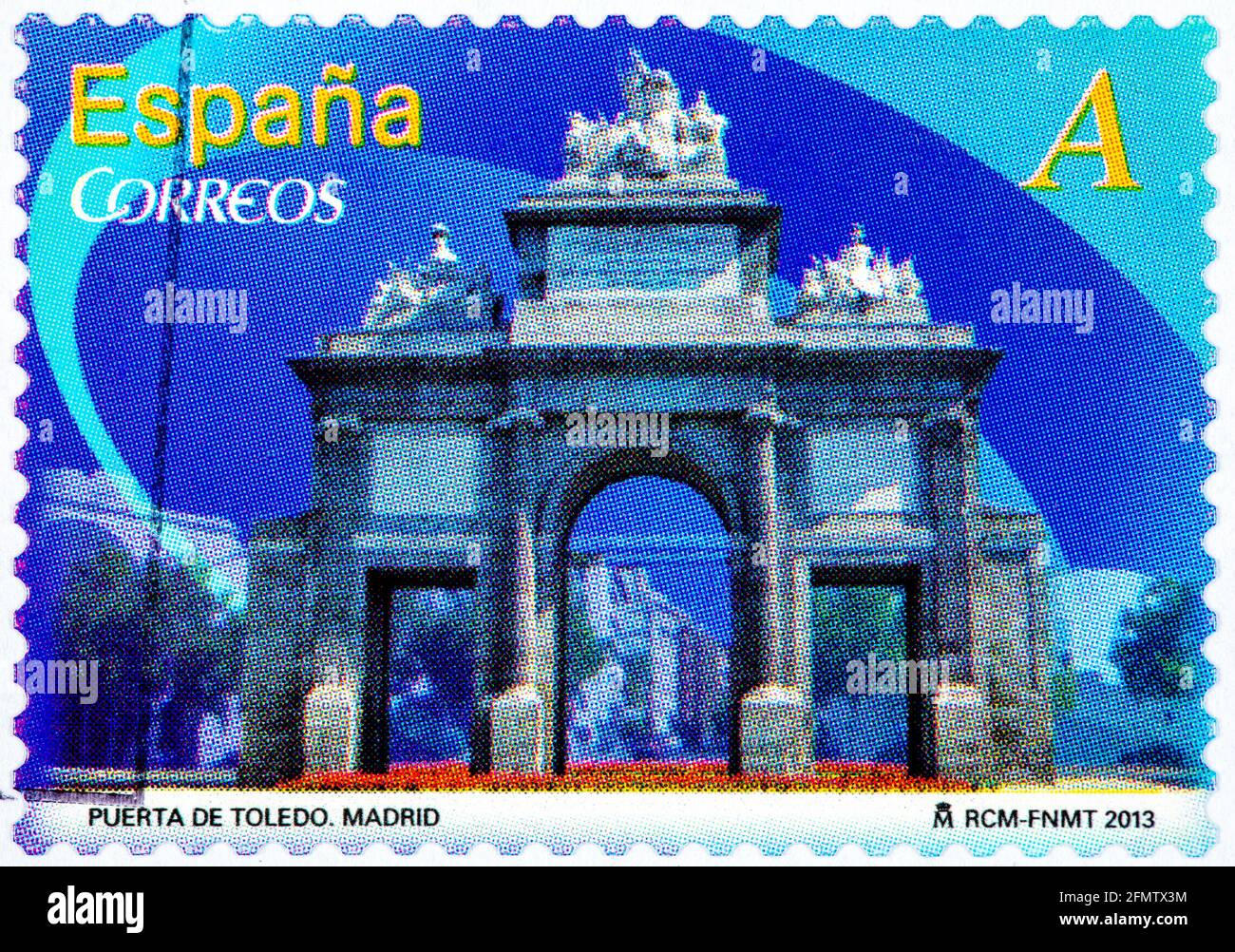 SPAIN - CIRCA 2012: A stamp printed in Spain from the 'Cultural Monumental arches and doors ' issue shows Door from Toledo to Madrid, circa 2012. Stock Photo