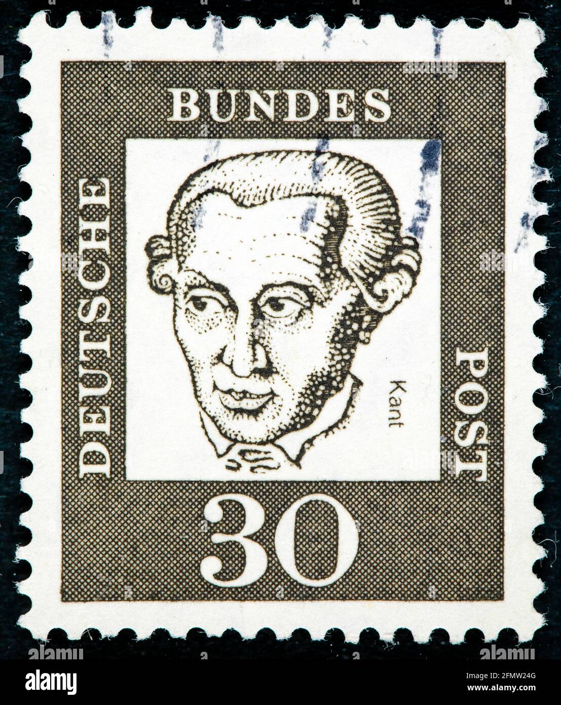 GERMANY - CIRCA 1961: a postage stamp from Germany, showing a portrait of the important German philosopher Immanuel Kant Stock Photo