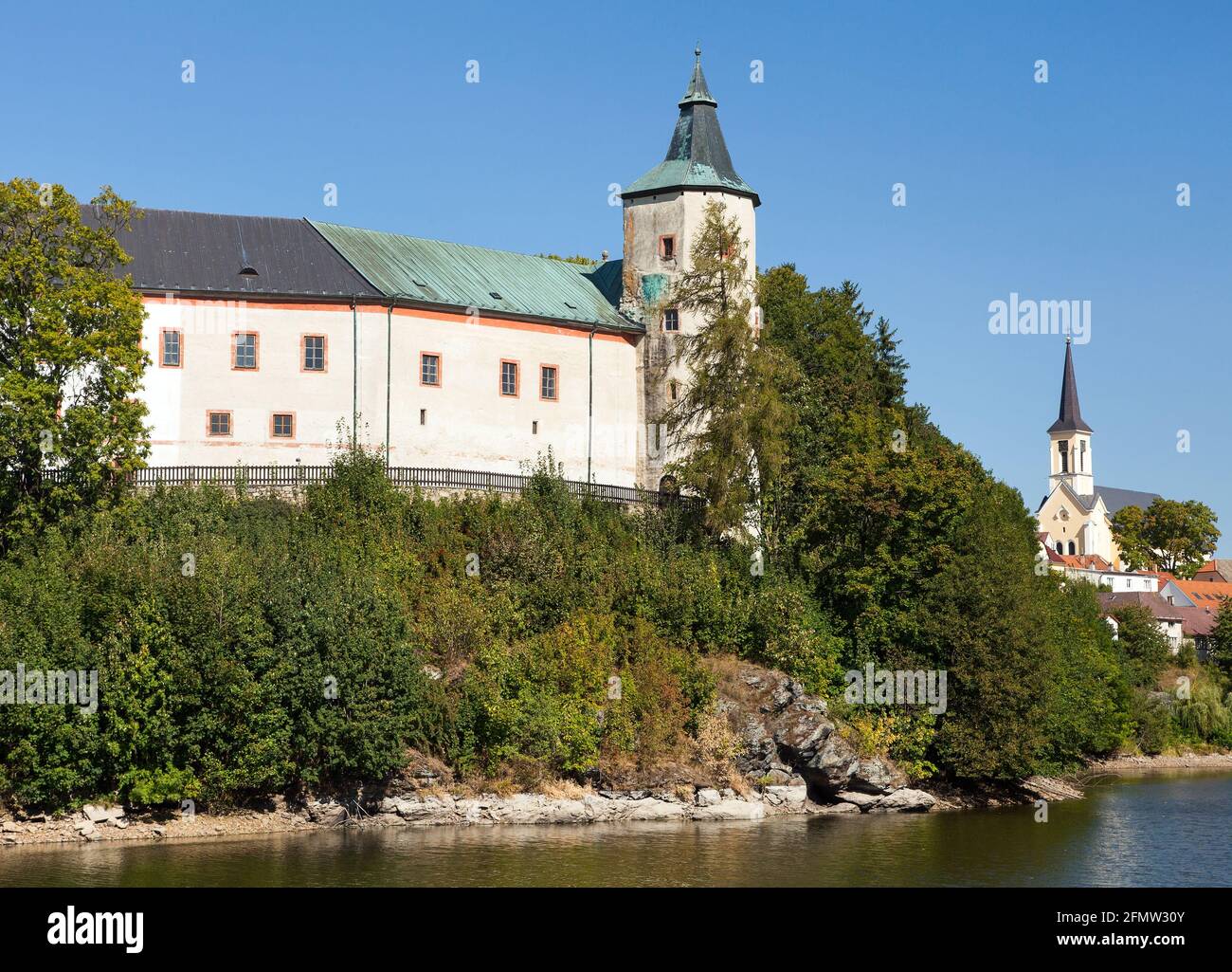 Zirovnice Renaissance and baroque castle standing above the water surface. Bohemian and Moravian Highlands, Czech Republic Stock Photo