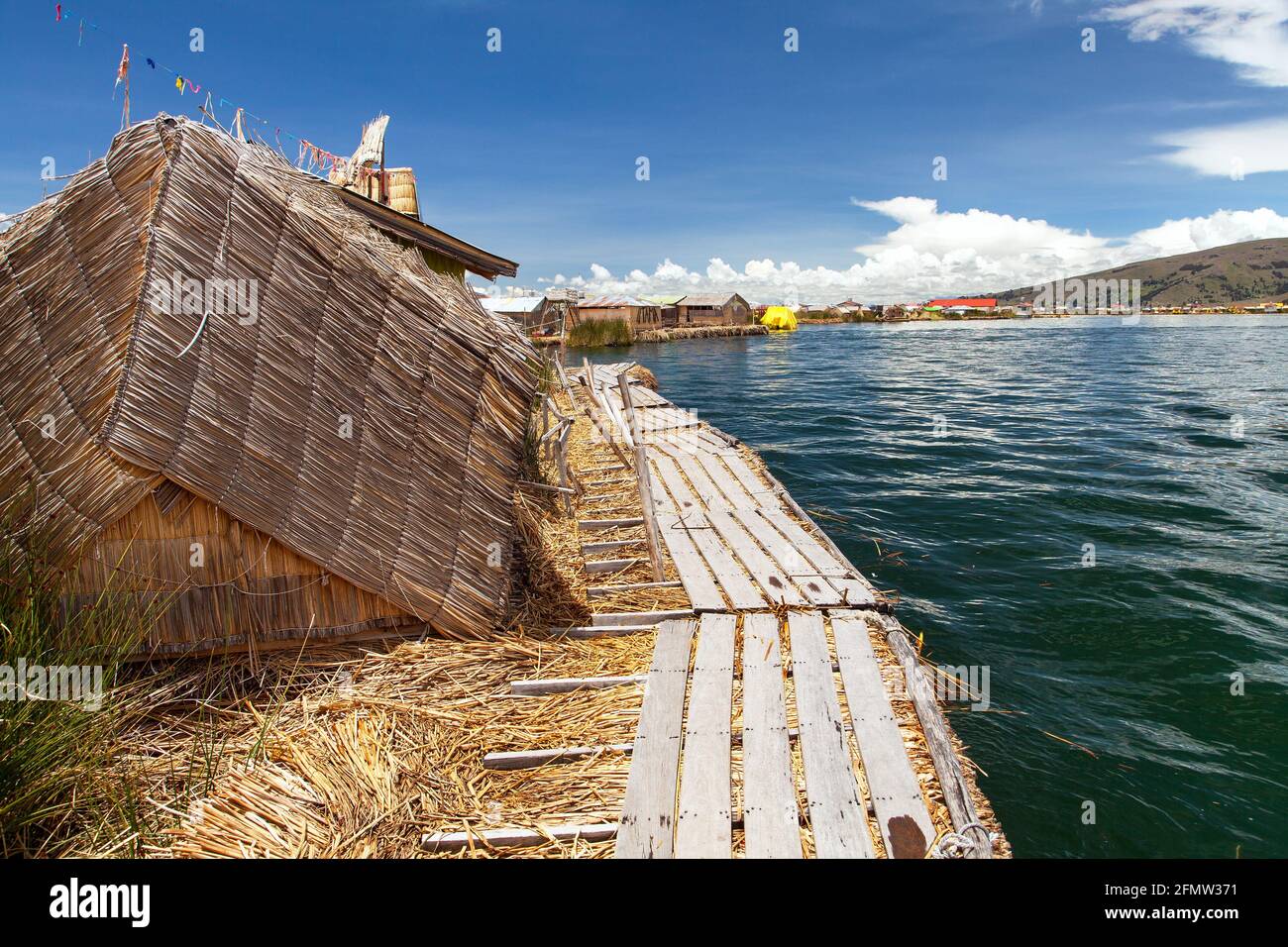 floating reed islands on lake Titicaca, Puno town, altiplano Peru Stock Photo