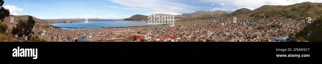 Puno city and Titicaca lake panoramic cityscape view from  Altiplano Peru Stock Photo