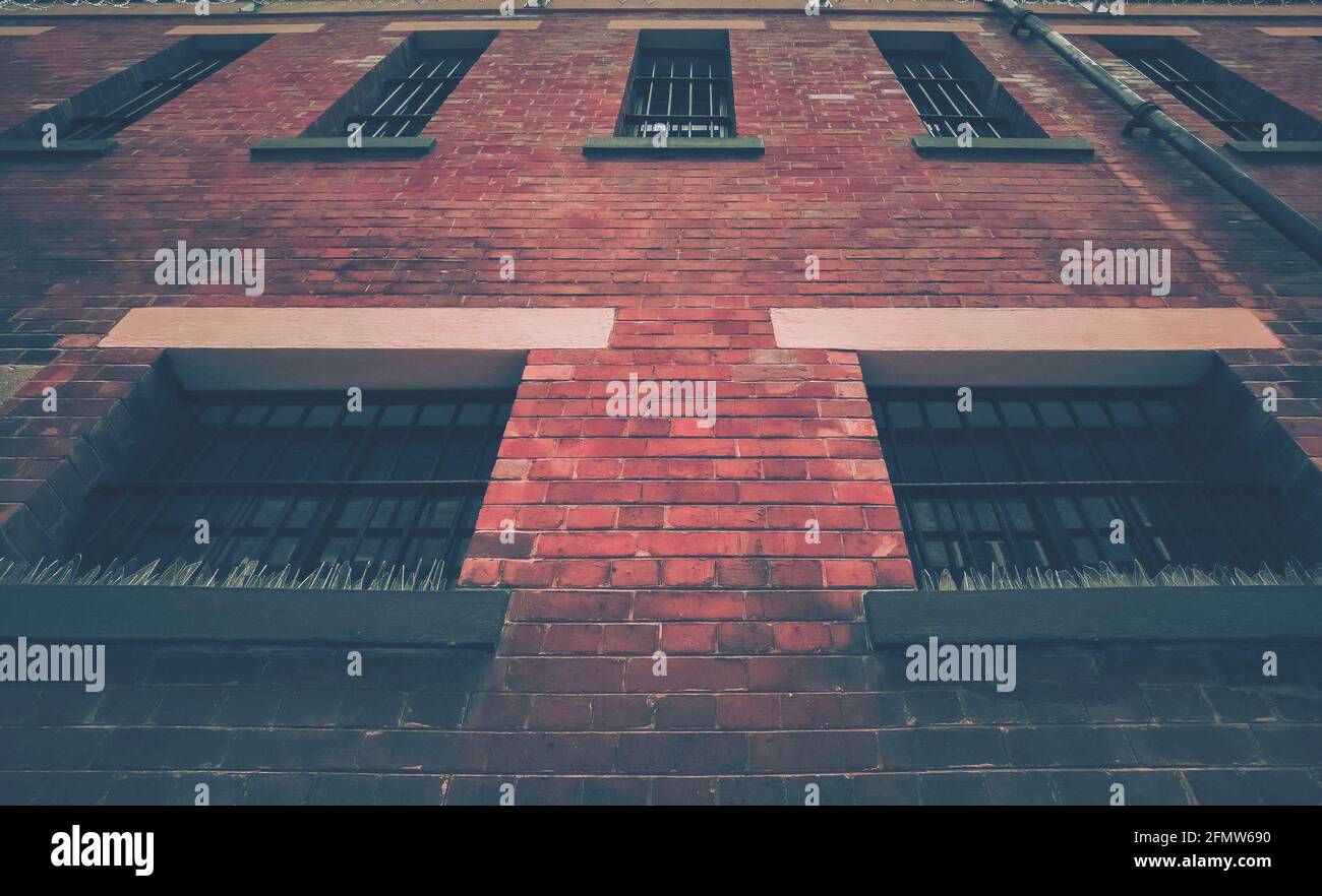 Old window and red wall, vintage style Stock Photo - Alamy