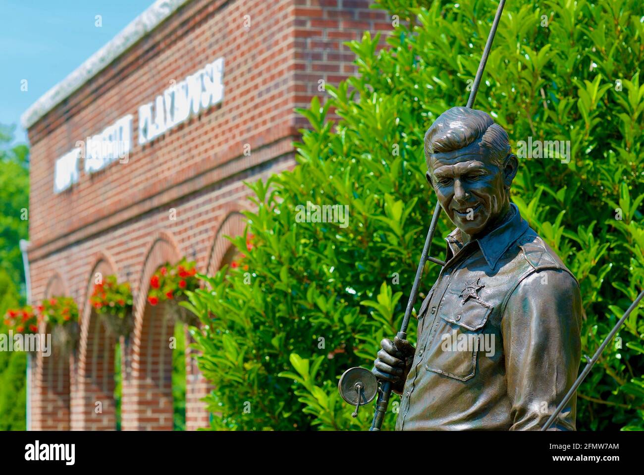 Mount Airy, North Carolina, USA - July 5, 2020: Close-up of a bronze statue of 'Sheriff Andy' of the popular 'The Andy Griffith Show' television show. Stock Photo