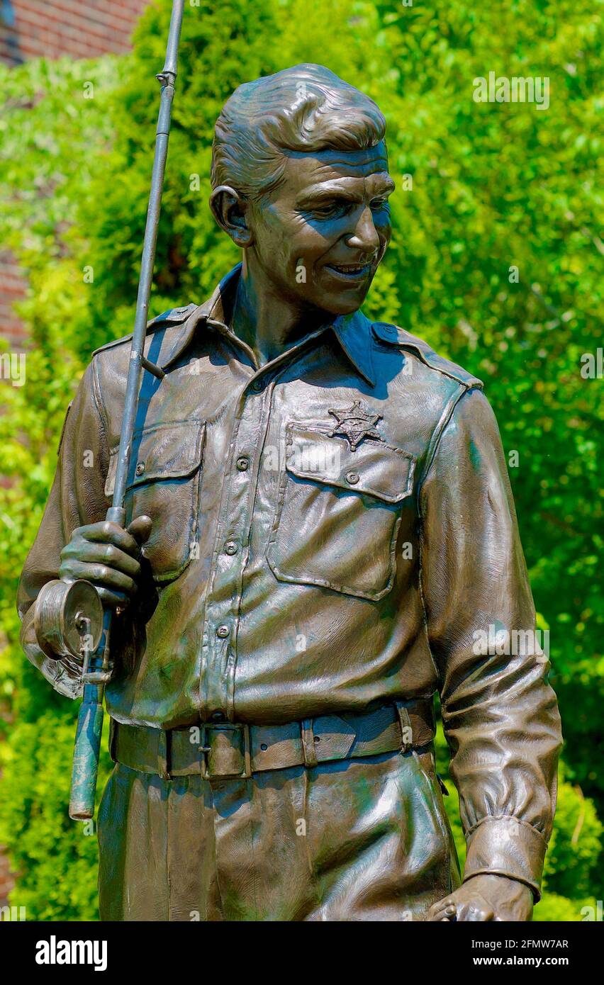 Mount Airy, North Carolina, USA - July 5, 2020: Close-up of a bronze statue of 'Sheriff Andy' of the popular 'The Andy Griffith Show' television show. Stock Photo