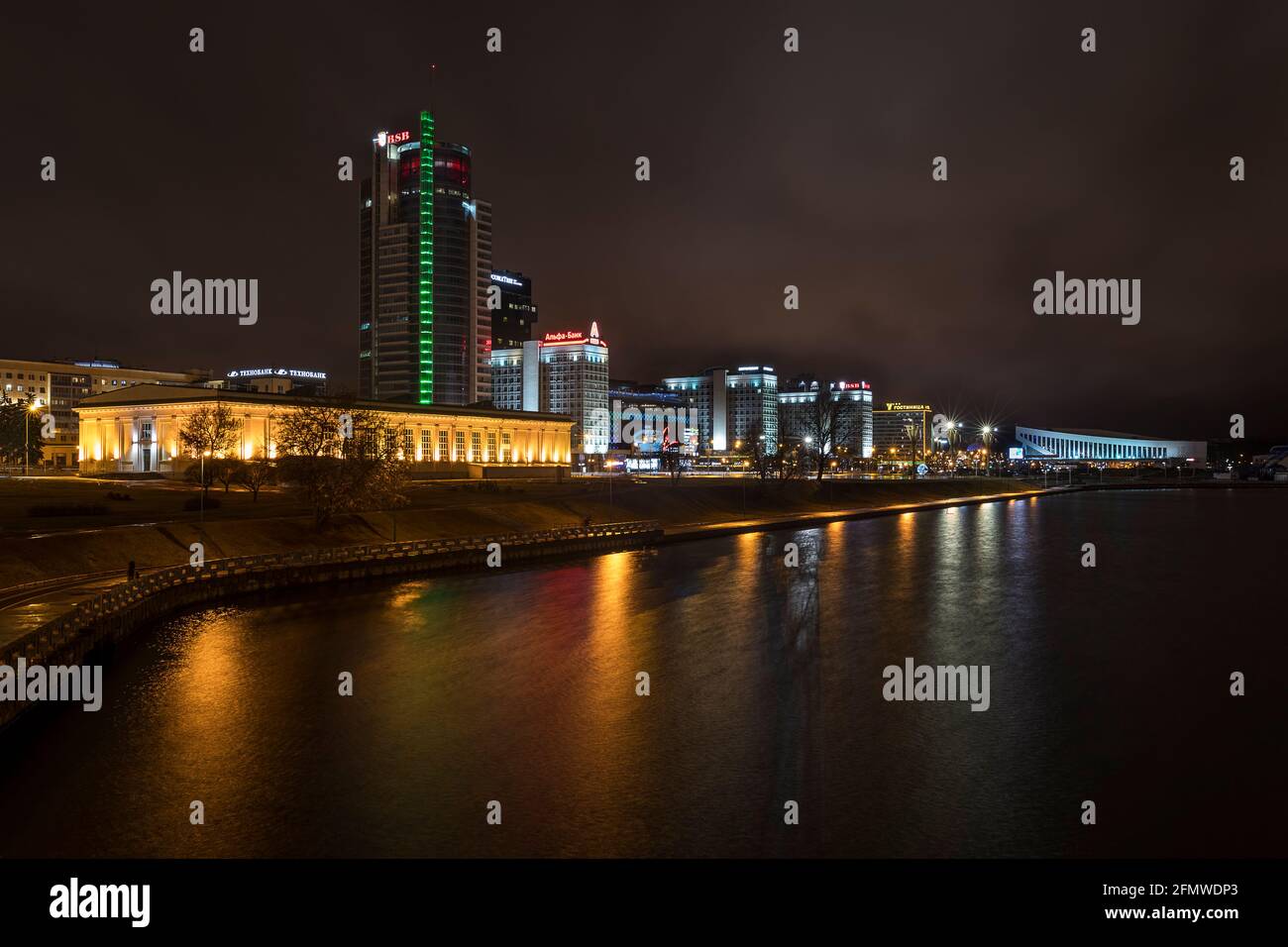 The skyline of Minsk and the river Svislach seen at a rainy night Stock Photo