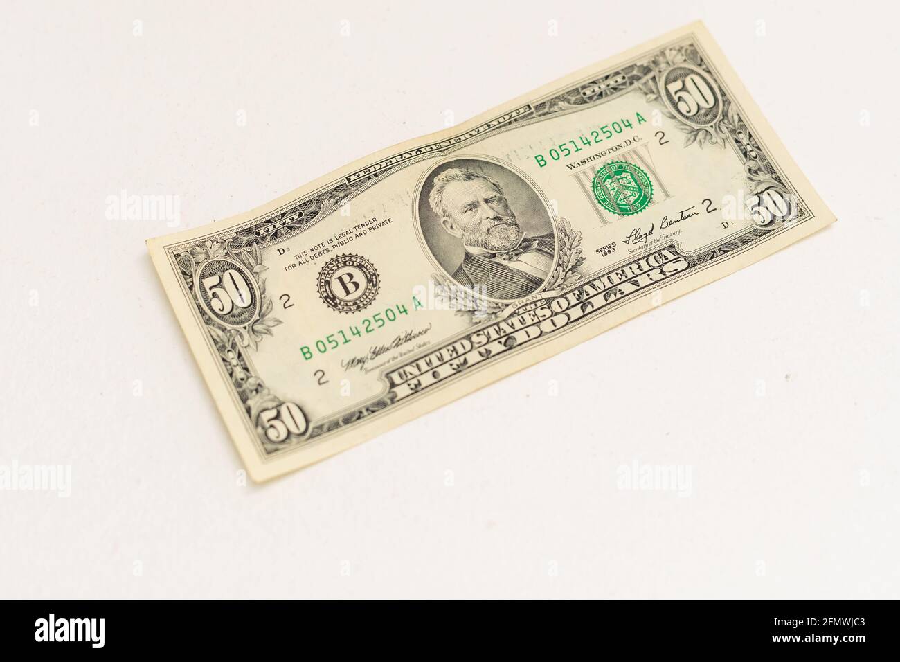 Close up dollar banknote on white background Stock Photo - Alamy