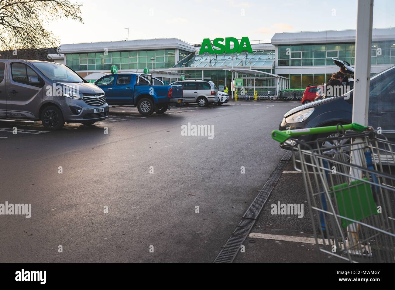 Asda store entrance with logo, car park Stock Photo Alamy