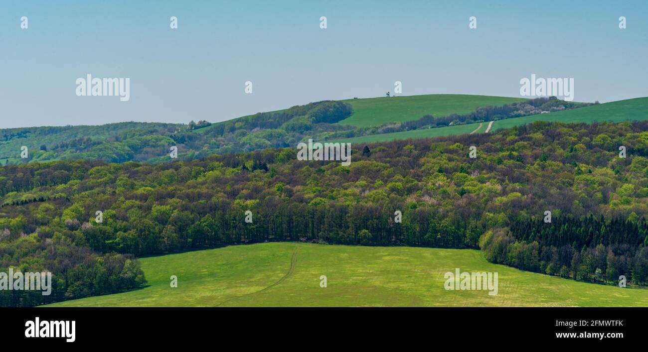 Zalostina hill in Biele Karpaty mountains from meadow above Javornik village in Czech republic during beautiful springtime day Stock Photo