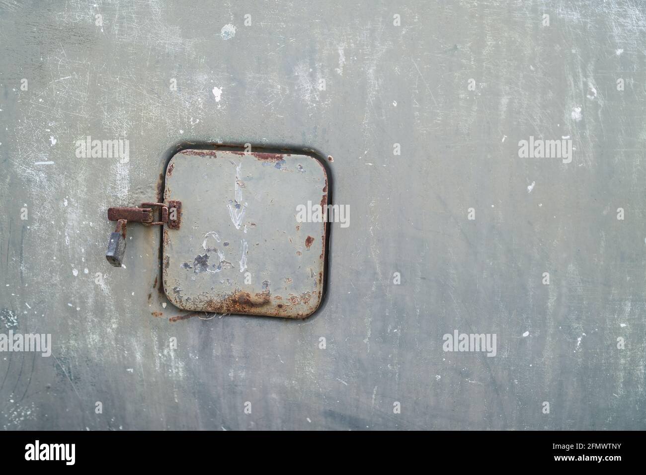 Closeup of a rusty, locked gas tank door Stock Photo Alamy