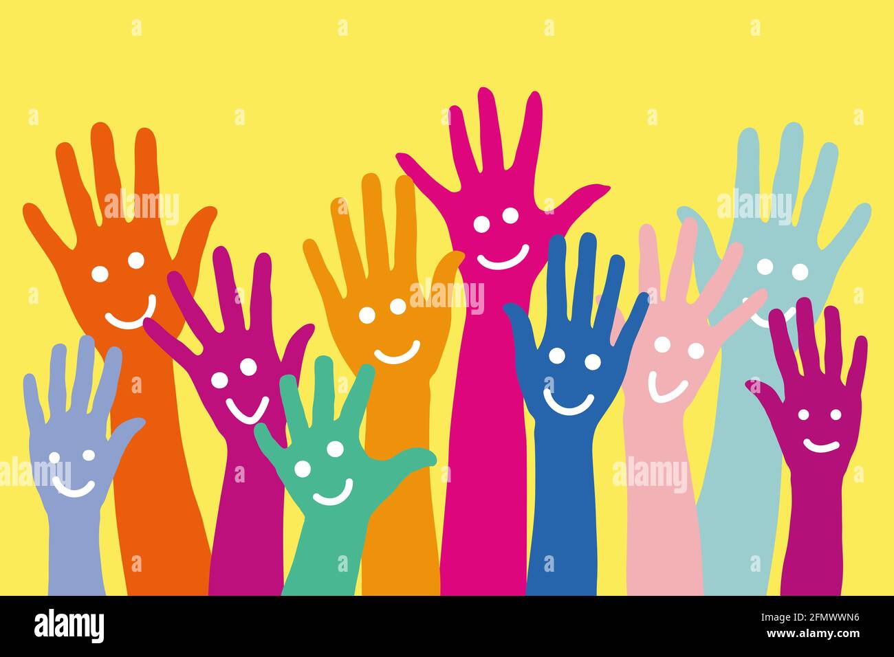 Many different colorful hands with smiley faces against a yellow background Stock Photo