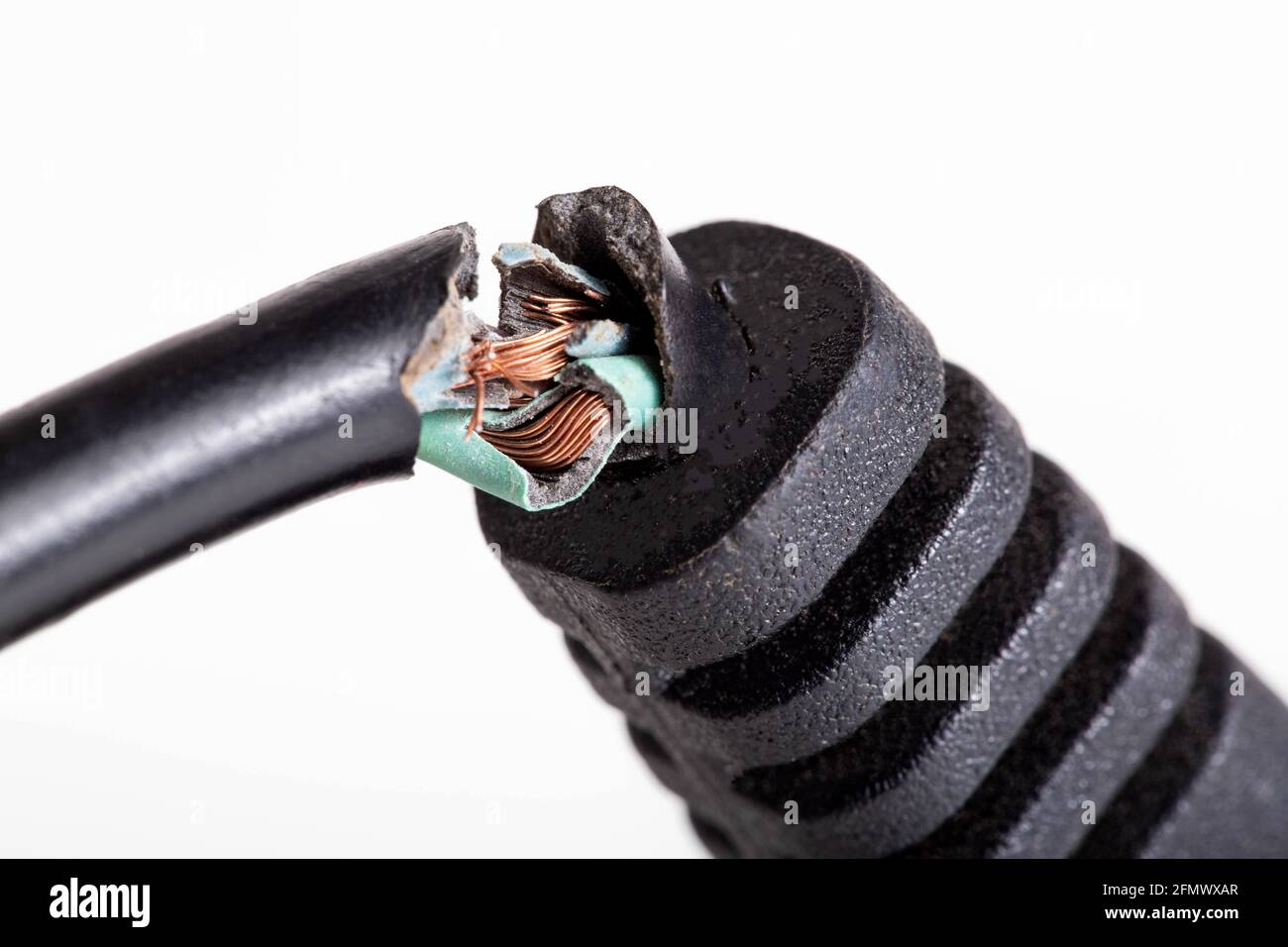 Broken electrical wire with a plug on a white background, isolate,  close-up. Electric shock, defective Stock Photo - Alamy