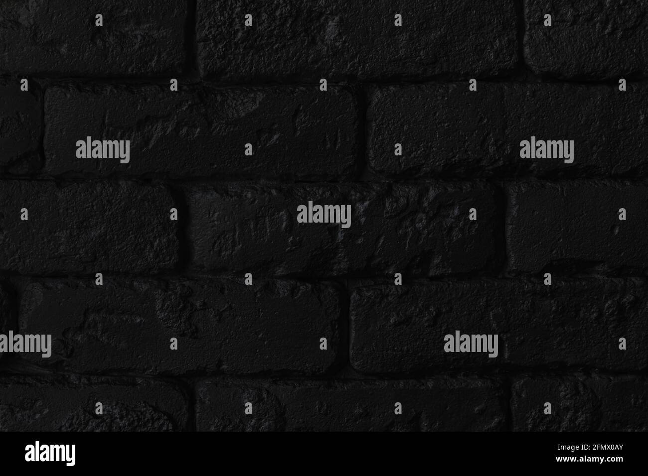 Abstract urban background. Modern dark gray brick wall texture Stock Photo