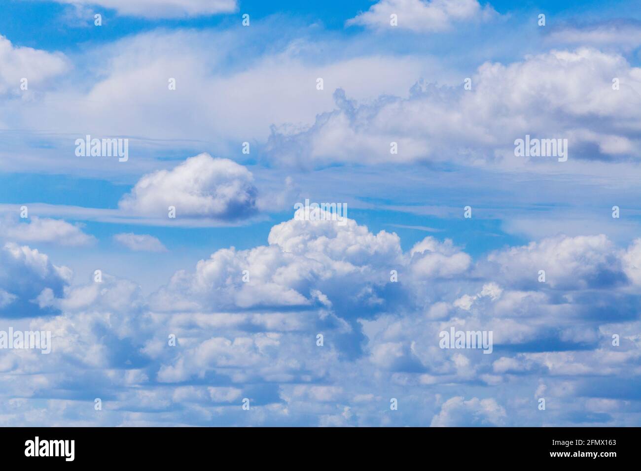 Bright Spring Afternoon Sky Above Thames Estuary with Fair-Weather  Cloud Stock Photo