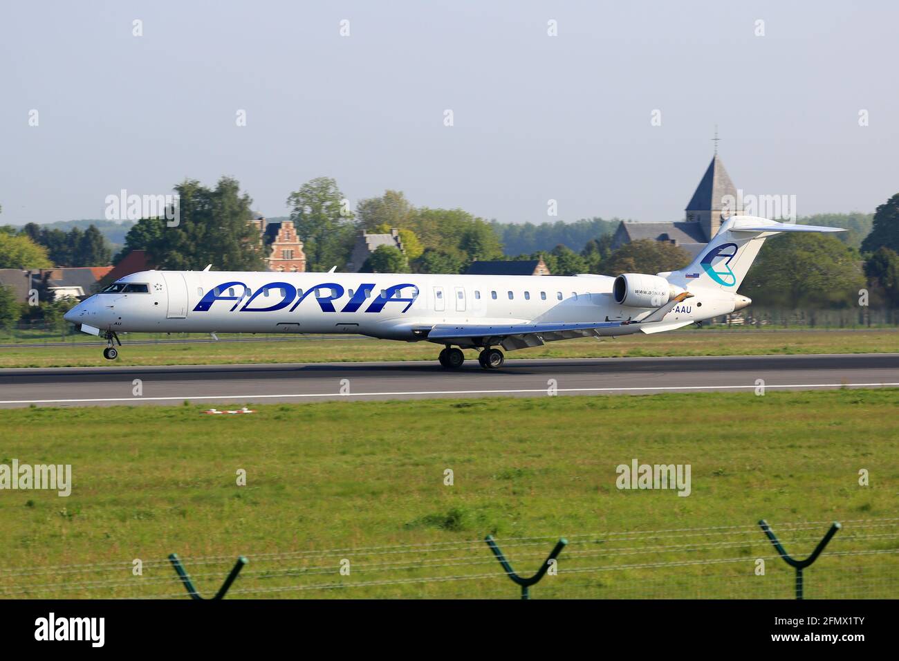 Brussels, Belgium – 10. May 2017: Adria Airways Bombardier CRJ-900 at Brussels airport (BRU) in Belgium. Stock Photo