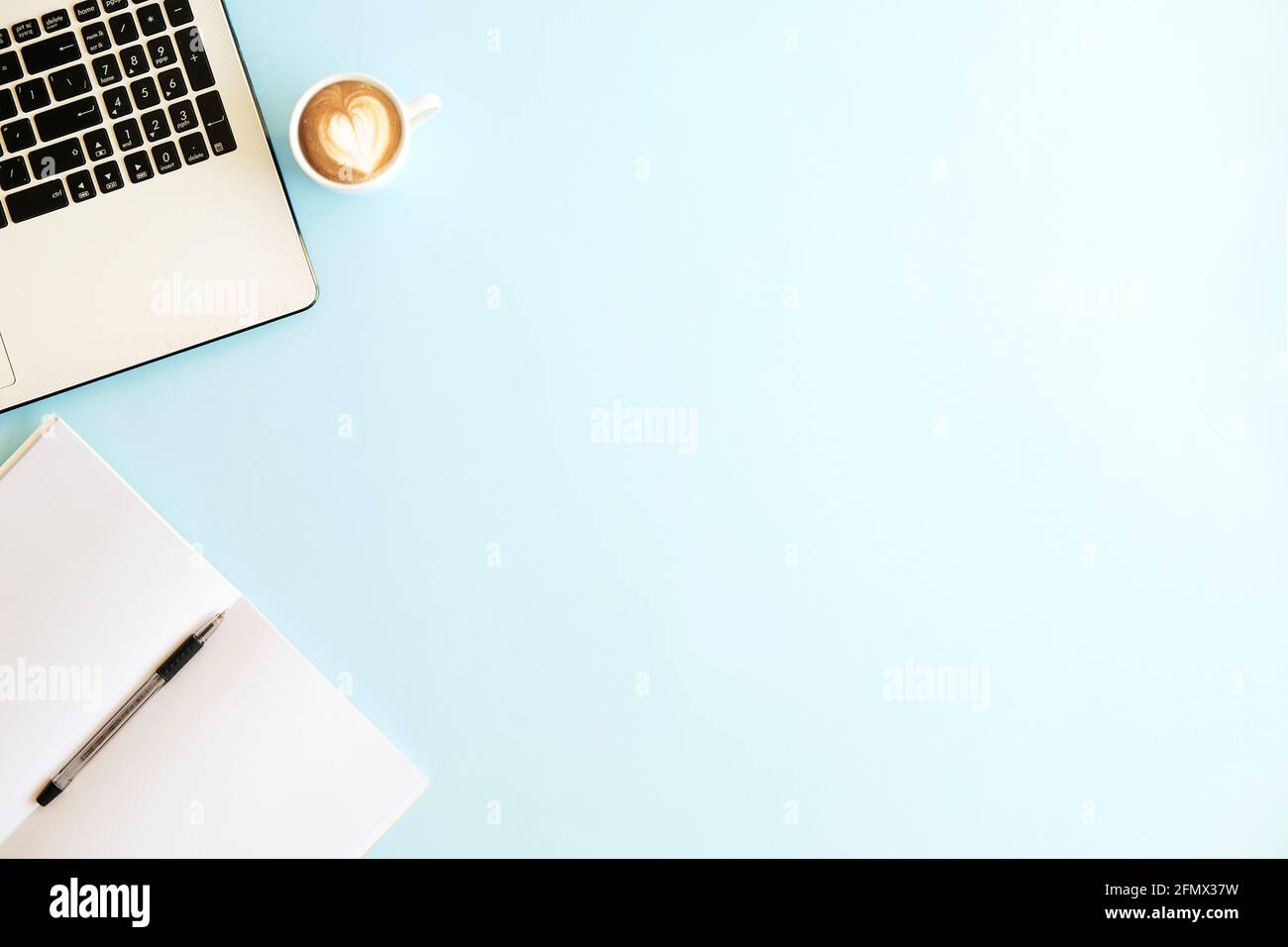 Minimalistic Flat Lay Composition Of Black White Laptop Computer Keyboard Cell Phone Coffee Cup Blank Page Notebook On Baby Blue Surface Desk Tab Stock Photo Alamy