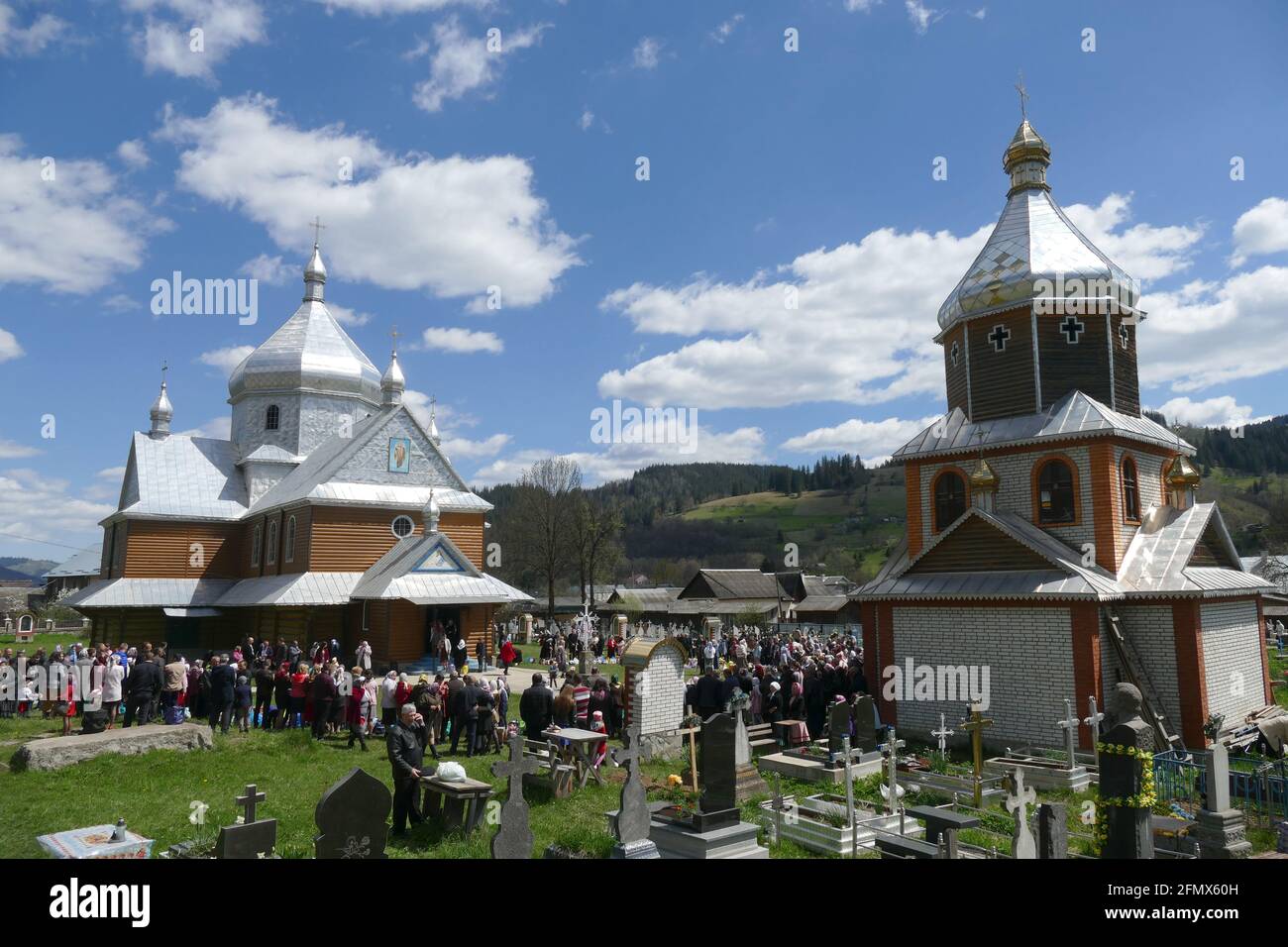CHEREMOSHNA, UKRAINE - MAY 9, 2021 - The Saint Michael's Church of the Orthodox Church of Ukraine is pictured on the first Sunday after Easter when pe Stock Photo