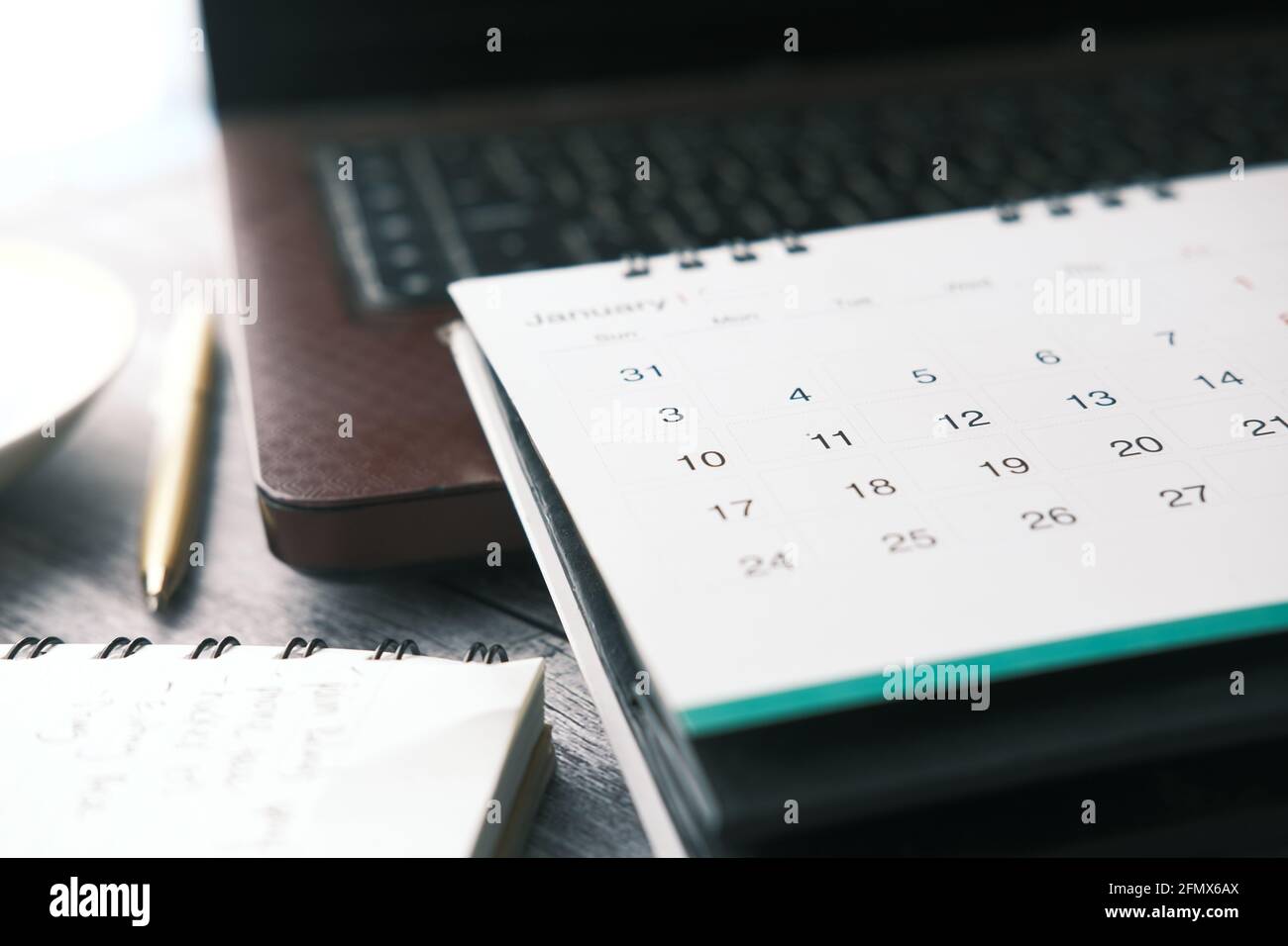 January month on calendar on office desk Stock Photo - Alamy