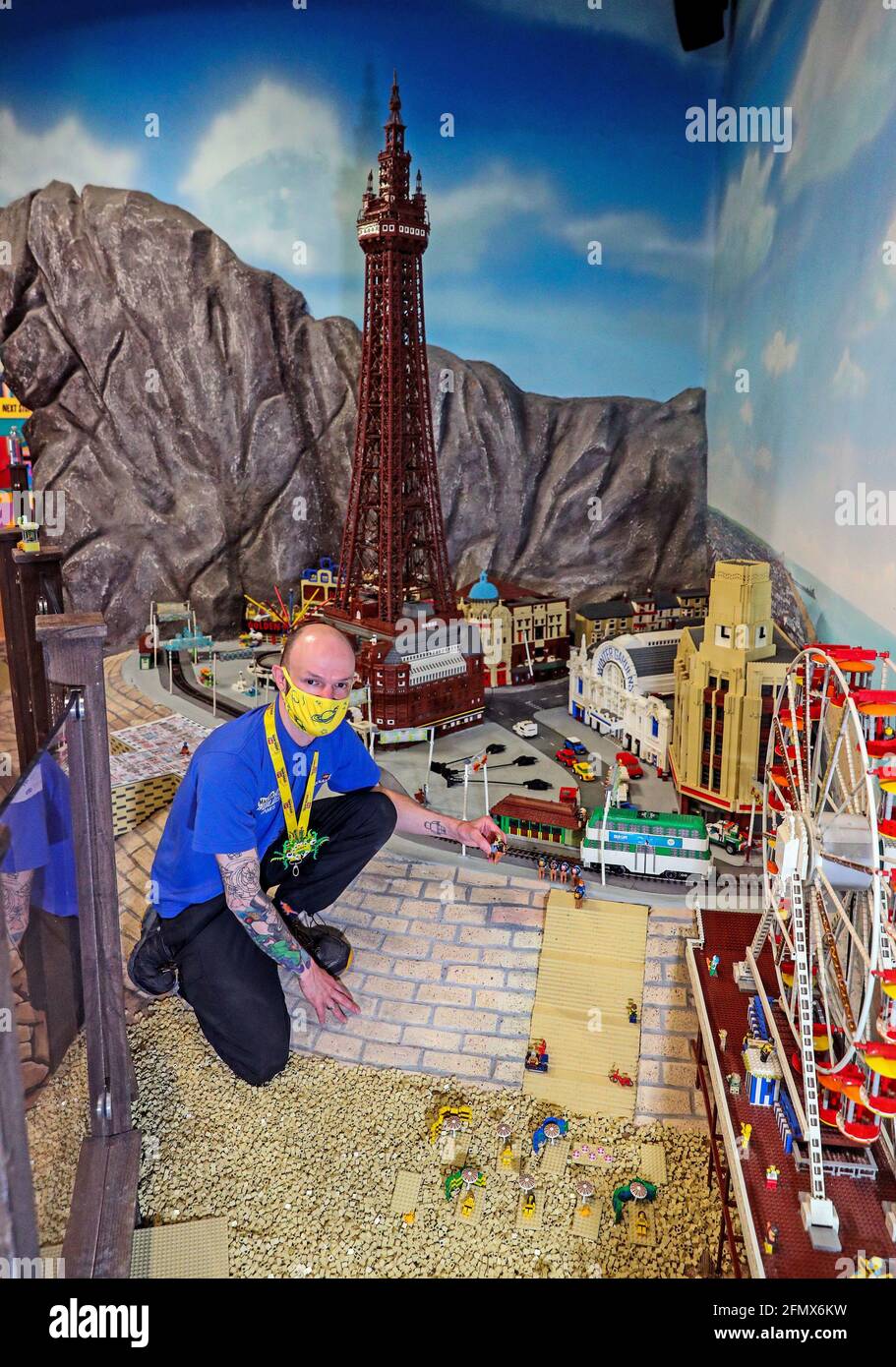 Master model builder James Windle at the Legoland Discovery Centre in Manchester makes final preperations to the models as the attraction gets ready for the public ahead of further easing of lockdown