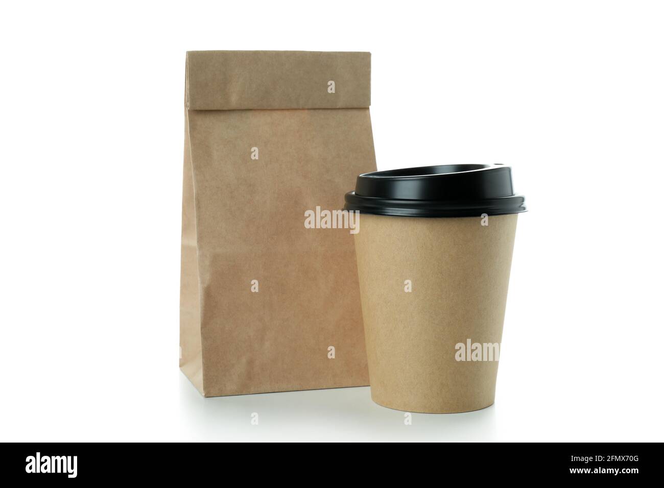 Paper cup and paper bag isolated on white background Stock Photo - Alamy