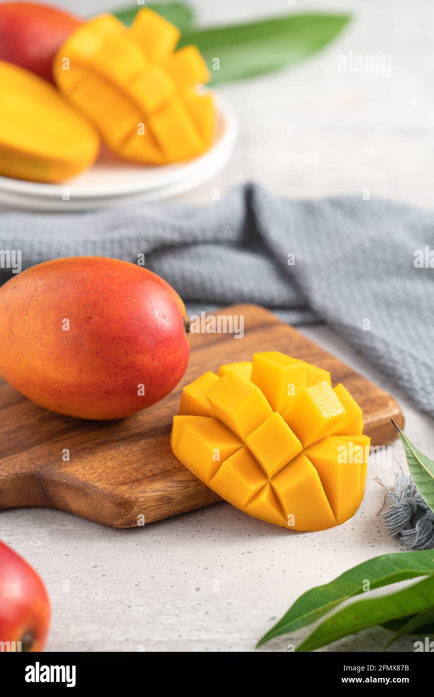 heart_plus. www.alamy.com/diced-fresh-<b>mango</b>-fruit-on-a-white-plate-over-woo...