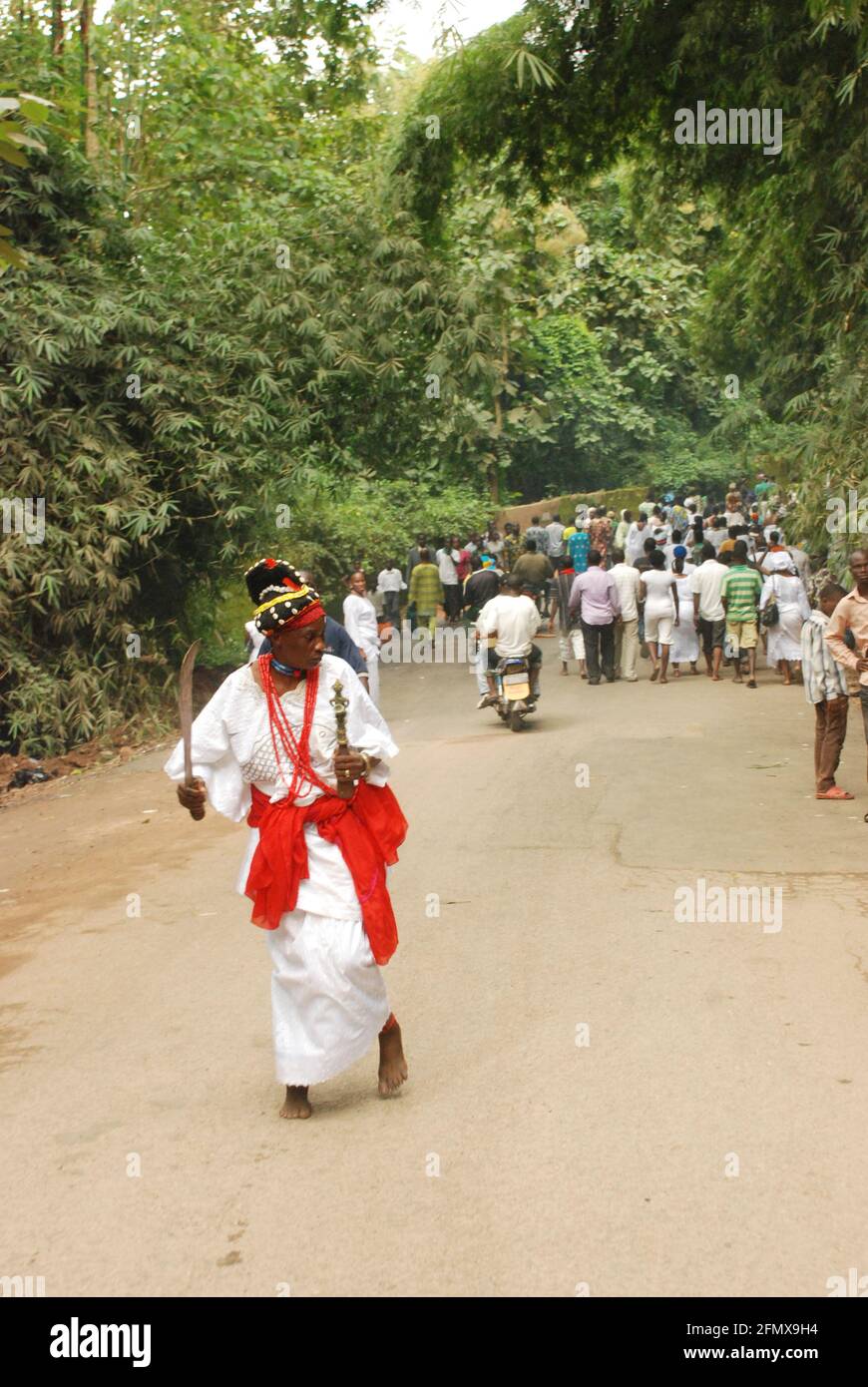 Osun Osogbo: Iya Oya walking backward during the Osun Osogbo Festival. Stock Photo