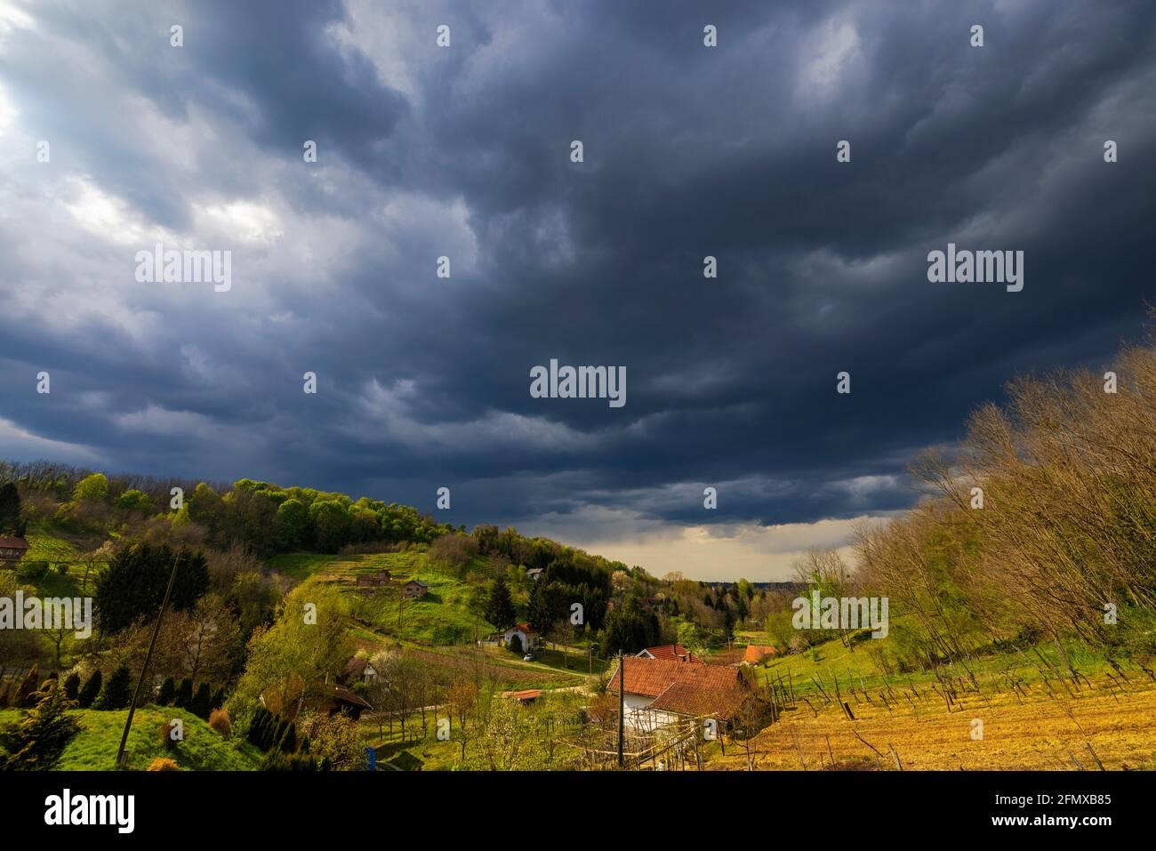 Stormy clouds over the hills in the countryside, Croatia Stock Photo