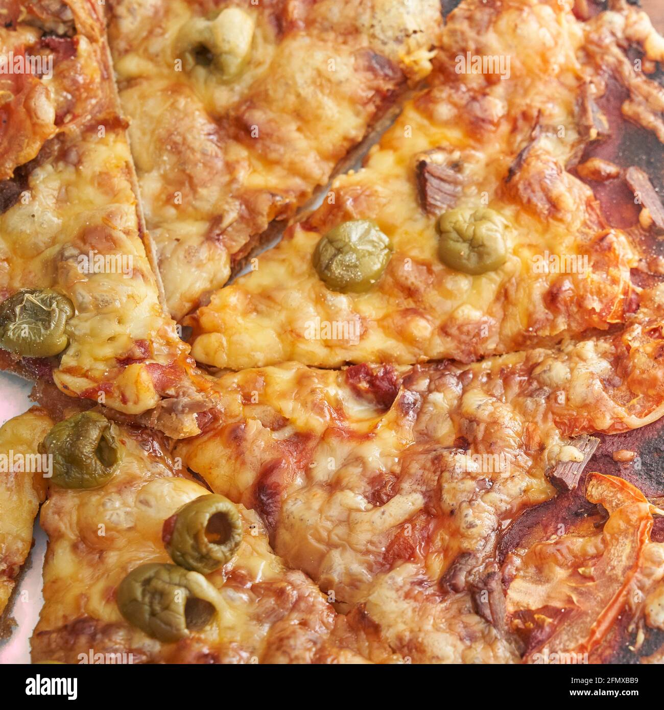 Healthy glutenfree pizza with beef and olives. Glutenfree cooking