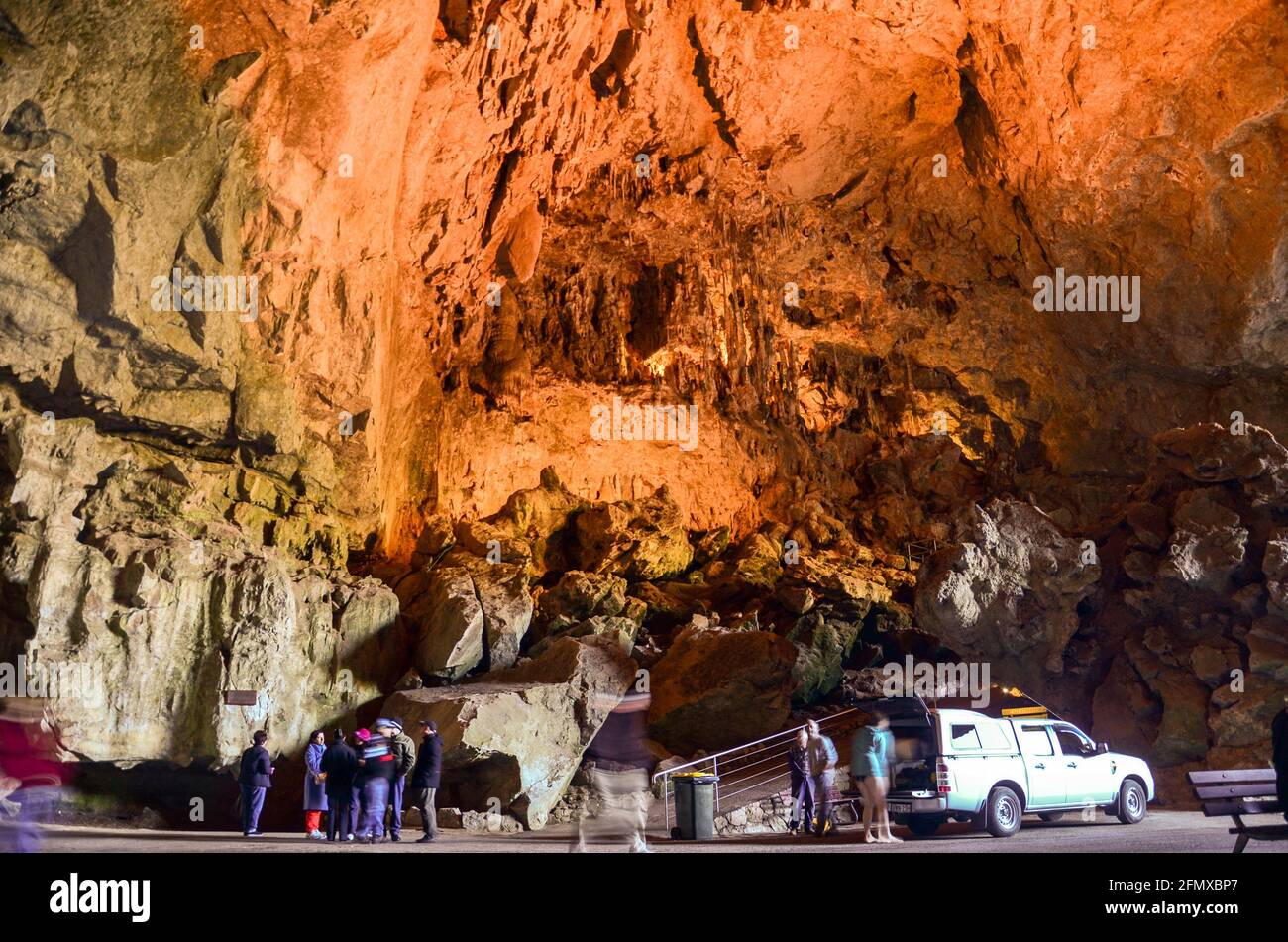 Grand entrance to the Jenolan Caves illuminated with artificial lights, near Katoomba, Australia