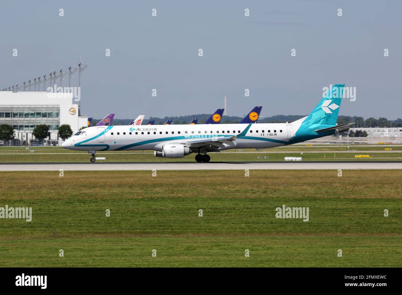 Munich, Germany – 8. August 2016: Air Dolomiti Embraer 195 at Munich airport (MUC) in Germany. Embraer is an aircraft manufacturer based in Brazil. Stock Photo