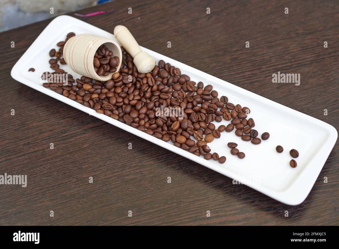 Coffee Beans with wooden mortar and Pestle Stock Photo Alamy