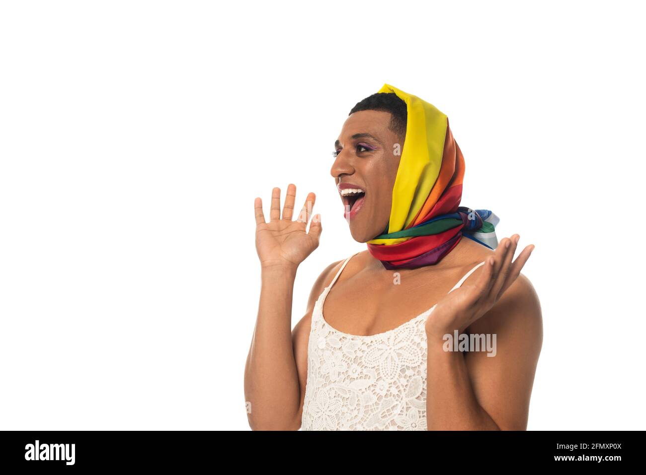 astonished african american androgynous man in lgbt colors head kerchief showing wow gesture isolated on white Stock Photo