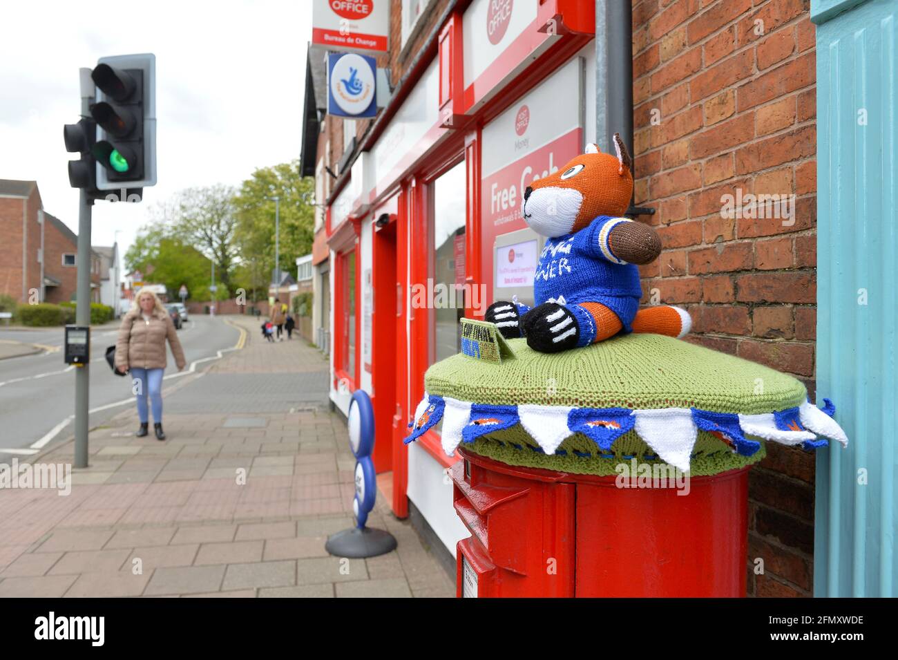 Leicester, Leicestershire, UK. 12th May, 2021. UK News. Another Leicester City Football Club themed yarn bomb has appeared on a post box in Syston ahead of the FA Cup Final between Leicester City and Chelsea at the weekend. Credit: Alex Hannam/Alamy Live News Stock Photo